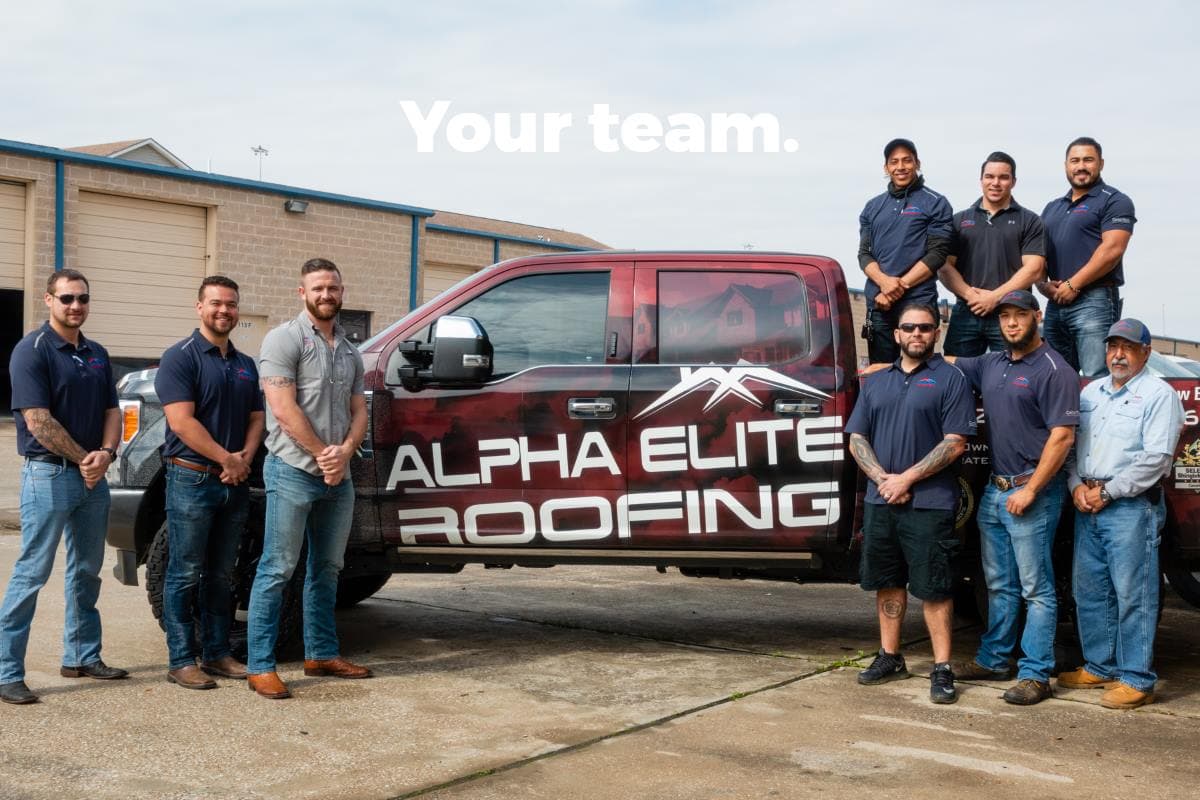Alpha Elite Roofing team poses next to branded truck, showcasing skilled professionals.