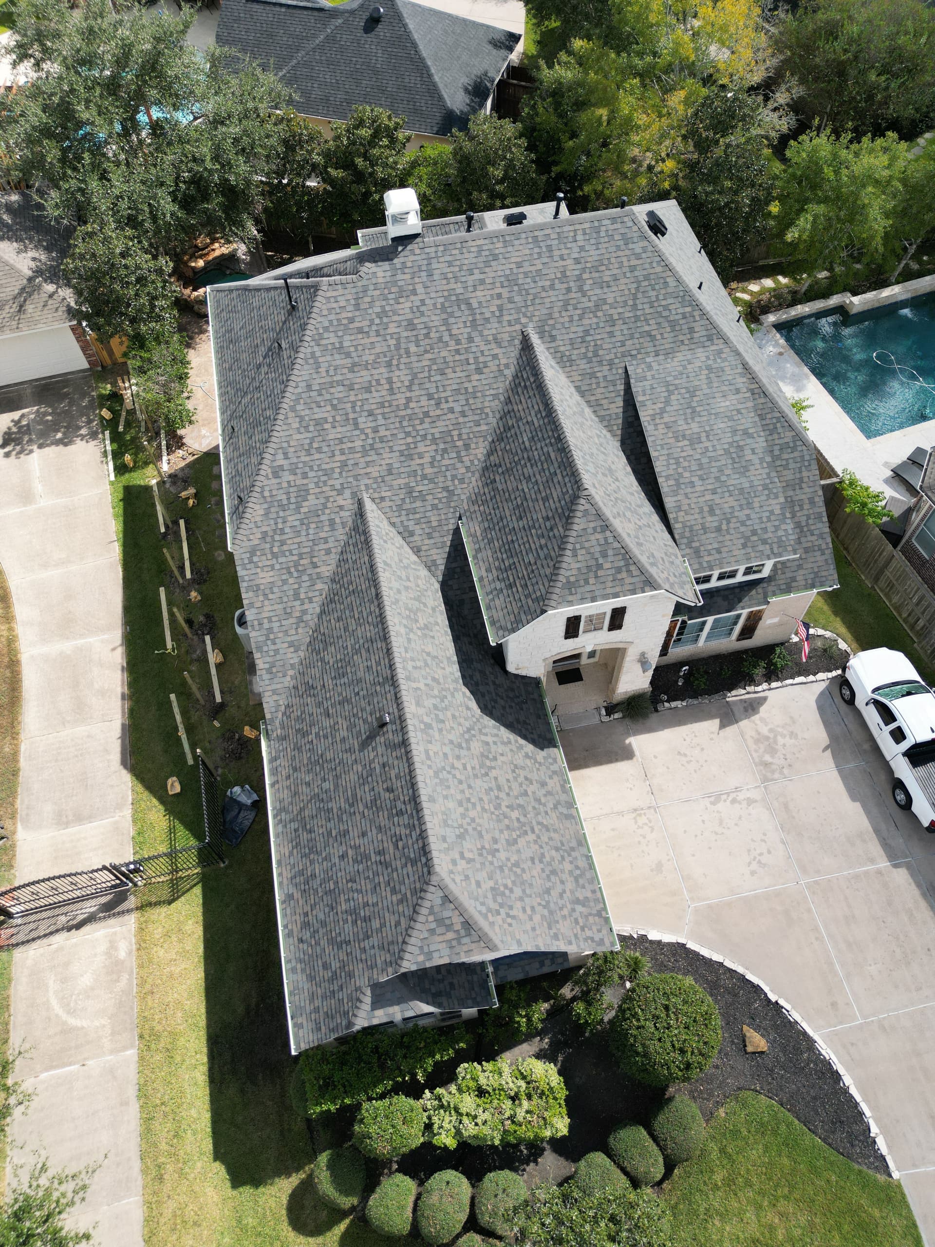 Elevate Your Home with Asphalt Shingle Mastery in Manvel TX